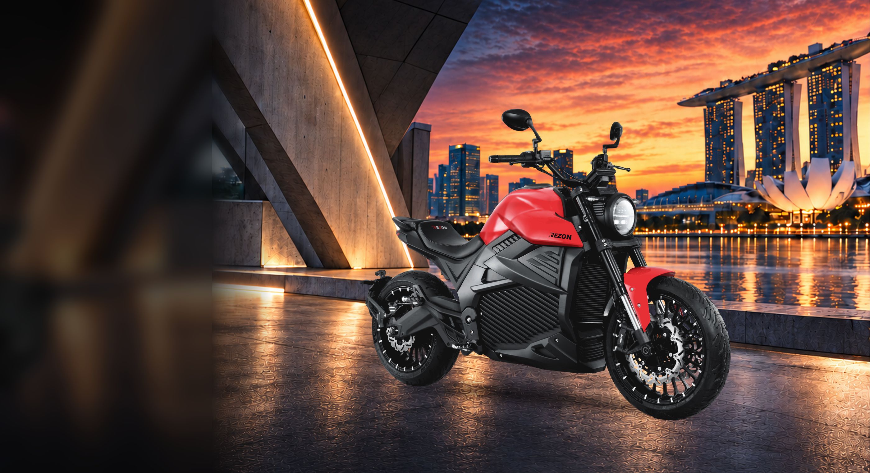 Red and black Rezon Bohemia electric motorcycle parked by Marina Bay at sunset